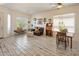 Bright living room showcasing distressed floors, neutral decor, comfortable seating, and great natural light at 4117 E Molly Ln, Cave Creek, AZ 85331