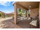 Covered patio with sturdy columns and desert landscaping offering a relaxing outdoor space at 4117 E Molly Ln, Cave Creek, AZ 85331