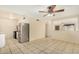 Eat-in kitchen with stainless steel appliances, tile floors, and natural light at 4219 W Pasadena Ave, Phoenix, AZ 85019