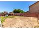 Expansive backyard with a play structure, offering outdoor entertainment and room for landscaping at 4702 N 124Th Ave, Avondale, AZ 85392