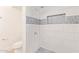 Inviting shower featuring modern tile work and a sleek shower head at 4808 N 24Th St # 230, Phoenix, AZ 85016