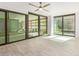 Sun-filled bedroom with large windows and tile flooring at 4808 N 24Th St # 230, Phoenix, AZ 85016