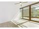 Sunlit bedroom showcasing large windows and neutral-toned flooring at 4808 N 24Th St # 230, Phoenix, AZ 85016