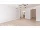 Bright bedroom featuring stylish ceiling fan, and an open view to the bathroom at 4808 N 24Th St # 230, Phoenix, AZ 85016