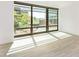 Sunlit living room featuring large windows offering a view at 4808 N 24Th St # 230, Phoenix, AZ 85016