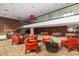 Spacious lobby area with comfortable seating, staircase, and views of the interior at 4808 N 24Th St # 230, Phoenix, AZ 85016