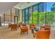 Welcoming lobby with cozy chairs and large windows overlooking greenery at 4808 N 24Th St # 230, Phoenix, AZ 85016