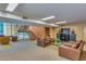 Comfortable lobby space with seating, stairs, and entertainment area at 4808 N 24Th St # 230, Phoenix, AZ 85016