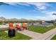 Relax on the roof deck with striped lounge chairs and scenic mountain views at 4808 N 24Th St # 230, Phoenix, AZ 85016