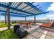 Rooftop deck featuring outdoor dining area with covered seating and lounge chairs at 4808 N 24Th St # 230, Phoenix, AZ 85016