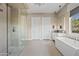 Beautiful bathroom featuring a glass shower, soaking tub, and double sinks at 5420 E Duane Ln, Cave Creek, AZ 85331