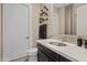 Well-lit bathroom featuring a modern vanity, sleek fixtures, and stylish wall decor accents at 5420 E Duane Ln, Cave Creek, AZ 85331