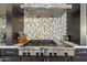 The kitchen features a KitchenAid cooktop, stainless steel hood, and stylish backsplash at 5420 E Duane Ln, Cave Creek, AZ 85331