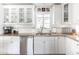 Clean kitchen with white cabinets, granite countertops, and stainless steel appliances at 5808 N 18Th Pl, Phoenix, AZ 85016