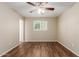 Empty bedroom features a wood ceiling fan, window, and wood-look flooring at 6126 N 31St Dr, Phoenix, AZ 85017