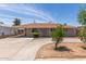 Single-level home featuring a covered carport and circular driveway with low maintenance landscaping at 6126 N 31St Dr, Phoenix, AZ 85017