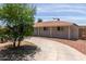 Well maintained single-level home featuring a circular driveway with low maintenance landscaping at 6126 N 31St Dr, Phoenix, AZ 85017