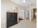 This bedroom features neutral paint, a ceiling fan, and carpeted floors at 6162 E Redmont Dr, Mesa, AZ 85215