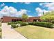 Exterior view of the homeowners association building showcasing well-maintained grounds and community pride at 6162 E Redmont Dr, Mesa, AZ 85215