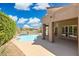 Backyard pool and landscaping, perfect for outdoor relaxation and enjoyment at 6162 E Redmont Dr, Mesa, AZ 85215