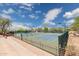 Tennis courts featuring well-maintained grounds, providing residents with opportunities for active recreation and friendly matches at 6162 E Redmont Dr, Mesa, AZ 85215