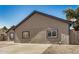 Side view of single story house with desert landscaping and paved driveway at 7506 W Sells Dr, Phoenix, AZ 85033
