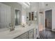 Bathroom featuring double sinks, vanity, and stylish mirror and lighting fixtures at 797 E Cedar Dr, Chandler, AZ 85249