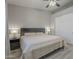 Comfortable bedroom with neutral tones, featuring a ceiling fan and a closet with sliding doors at 797 E Cedar Dr, Chandler, AZ 85249