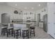 Spacious kitchen with white cabinetry, granite countertops, and a center island with seating at 797 E Cedar Dr, Chandler, AZ 85249