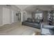 Open-concept living room with bright walls, hardwood floors, and modern furniture at 797 E Cedar Dr, Chandler, AZ 85249