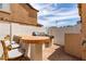 Backyard BBQ area with built-in grill and seating at 84 E Joseph Way, Gilbert, AZ 85295