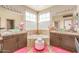 Elegant bathroom with a soaking tub, double sinks, and tasteful decor at 84 E Joseph Way, Gilbert, AZ 85295