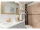 Stylish bathroom with a decorative mirror, attractive fixtures and a stand-up shower at 84 E Joseph Way, Gilbert, AZ 85295