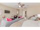 Comfortable primary bedroom with a cozy sitting area and ample space for relaxation at 84 E Joseph Way, Gilbert, AZ 85295