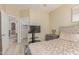 Comfortable bedroom featuring a TV, bedside table, and relaxing decor. A great place to unwind after a long day at 84 E Joseph Way, Gilbert, AZ 85295