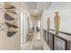 Inviting hallway featuring modern decor, a stylish console table, and a wine refrigerator at 84 E Joseph Way, Gilbert, AZ 85295