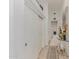 Bright hallway with closet and decor leading to laundry room at 84 E Joseph Way, Gilbert, AZ 85295