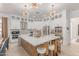 Beautiful white kitchen featuring stainless steel appliances and a large center island with seating at 84 E Joseph Way, Gilbert, AZ 85295