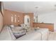 Elegant living room features a large sectional, stylish decor, and a pass-through bar at 84 E Joseph Way, Gilbert, AZ 85295