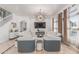 Stunning living room with elegant furniture, fireplace, TV feature wall, and statement lighting at 84 E Joseph Way, Gilbert, AZ 85295