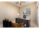 Home office with functional desk space, window view, and comfortable seating at 84 E Joseph Way, Gilbert, AZ 85295