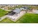 Aerial view of the community park featuring a covered picnic area, green space, and recreational amenities at 8836 W Orange Dr, Glendale, AZ 85305