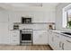 Well-designed kitchen with stainless steel appliances, granite countertops, and ample storage at 912 W Sunward Dr, Gilbert, AZ 85233