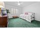 Bedroom featuring carpet floor, twin bed and dresser at 9637 E Gold Dust Ave, Scottsdale, AZ 85258