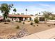 Charming single story home featuring desert landscaping and a cozy tile roof at 9637 E Gold Dust Ave, Scottsdale, AZ 85258