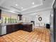 Open kitchen featuring stone countertops, stainless steel appliances, and a large island at 9637 E Gold Dust Ave, Scottsdale, AZ 85258