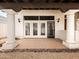 Covered patio with tile flooring, columns, and french doors for outdoor enjoyment at 9637 E Gold Dust Ave, Scottsdale, AZ 85258