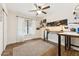 Bedroom features hardwood floors, a ceiling fan and a cozy atmosphere at 9801 W Rockwood Dr, Peoria, AZ 85382