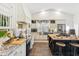 Stylish kitchen featuring stainless steel appliances, custom cabinetry, and a functional center island with seating at 9801 W Rockwood Dr, Peoria, AZ 85382