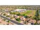 Beautiful aerial view showcases the home's location near a school and community amenities at 11048 E Quintana Ave, Mesa, AZ 85212